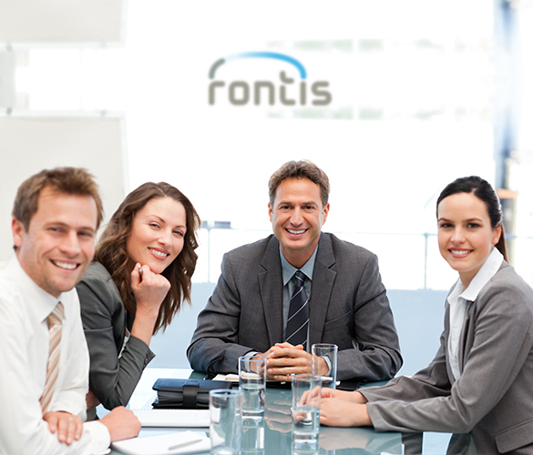 Portrait of a positive team sitting at a table